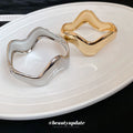 Wide Polished Wave Hinged Bangle In Gold Or Silver Tone view 2