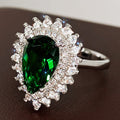 Pear-Shaped Double-Halo Ring In Four Center Stone Colors view 1