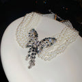 Layered Pearl Butterfly Necklace in Polished Mixed Media Design view 1
