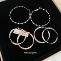 Textured Metal Hoop Earrings in Three Twisted Designs view 3