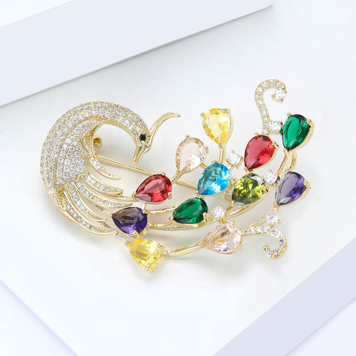 Multicolor Crystal Peacock brooch shown in angled product view
