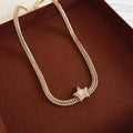 Gold Tone Double Chain Necklace With Star Centerpiece view 6