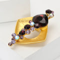 Gold Tone Open Square Brooch With Burgundy Crystal Cascade view 2