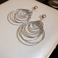 Layered Metal Circle Drop Earrings with Reflective Details view 8