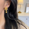 Gold Tone Crystal Flower Cluster Drop Earrings with Metal Tone Details view 2