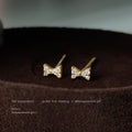 Gold Mini Bow Stud Earrings Clear Pavé Cubic Zirconia view 1