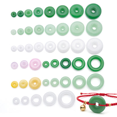 Green bead beads arranged on a light background