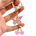 Pink Butterfly Cherry Charm Keychain with Gold Hardware view 5