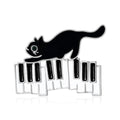Enamel Cat on Piano Keyboard Brooch Black and White view 1