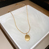 Gold Oval Disc