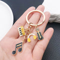 Yellow-Led Guitar Piano Violin and Headphone Charm Keychain Collection view 2