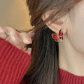 Red Enamel Butterfly Stud Earrings with Gold Tone Trim view 4