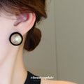 Round Pearl Center Black Rim Stud Earrings With Decorative Metal Accents view 3