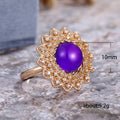 Gold Tone Purple Cabochon Floral Statement Ring With Polished Clear Stone Detail view 5