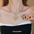 Gold Tone Textured Shield Necklace And Red Teardrop Square Earrings view 2