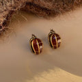 Brown And Gold Gradient Hoop Earrings With Decorative Metal Details view 1