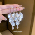 White Floral Shell and Pearl Drop Earring Collection view 1