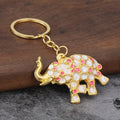 Gold-Tone Metal Elephant Keychain with White and Colored Inlays view 9