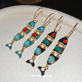 Colorful Articulated Fish Drop Earrings In Red Black And Blue view 2