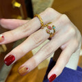 Gold Twisted Band Ring Multicolor Tiny Inset Stones view 2