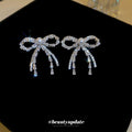 Silver Tone Crystal Bow Stud Earrings With Chain Tassels view 4