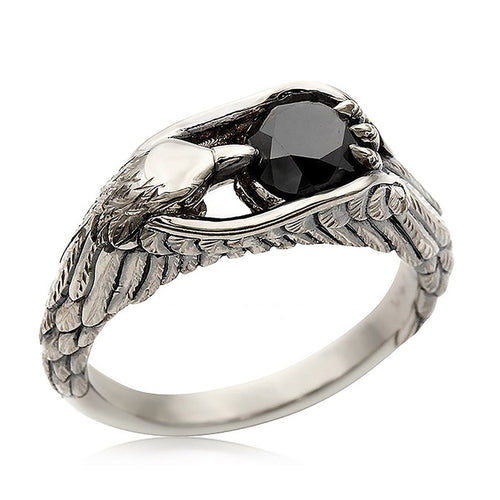 Eagle wing ring side angle showing feather texture and stone