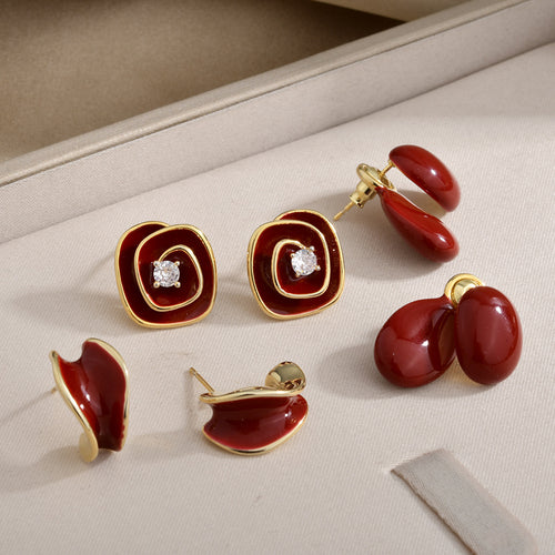 Burgundy curved oval and layered square stud earrings