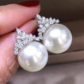 Silver Tone Crown Pearl Stud Earrings Clear Pavé Top view 5