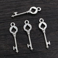 Vintage Key Charms in Antique Bronze and Silver Tone Finishes view 2