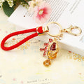 Gold Toad and Coin Keychains with Braided and Bare Wrist Loops view 2