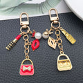 Red Pink White and Black Fashion Charm Keychains with Metal Hardware view 3