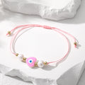 Cord and Pearl Accent Heart Evil Eye Bracelets in Nine Colors view 7
