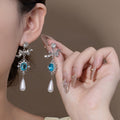 Blue Oval White Pearl Look Silver Floral Dangle Earrings view 6