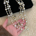 Black and White Bow Charm Long Pearl Strand Necklace view 2