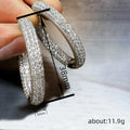 Large Oval Pave Hoop Earrings In Gold And Silver Tones view 4