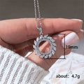 Silver Tone Olive Leaf Circle Pendant Necklace With Stones view 5