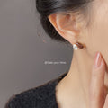 Gold-Tone Teardrop CZ Stud Earrings Brown Enamel Accent view 2