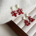 White Ball Stud Red Enamel Character Charm Drop Earrings view 1