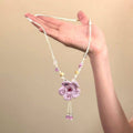 Woven Flower Bead Pendant Necklace with Polished Metal Tone Details view 2