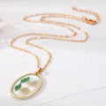 Gold Tone Oval Resin Pressed Flower Pendant Necklaces in Six Colors view 5