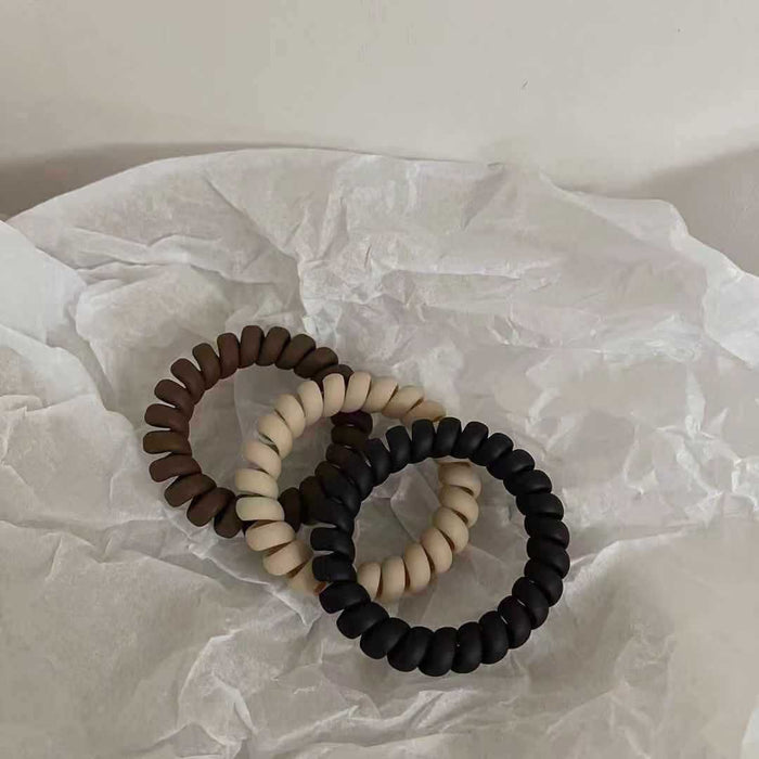 Black Matte Telephone Cord Spiral Coil Hair Tie With Thick Profile