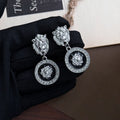 Clear Stone Top Black Round Silver Tone Medallion Earrings view 4