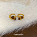 Gold Tone Twisted Hoop Earrings With Faceted Brown Square Stones view 3