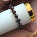 Dark Wood Bead Cross Stretch Bracelet with Silver Tone Spacers view 4
