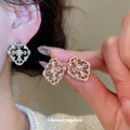 Openwork Quatrefoil Stud Earrings in Gold and Silver view 2