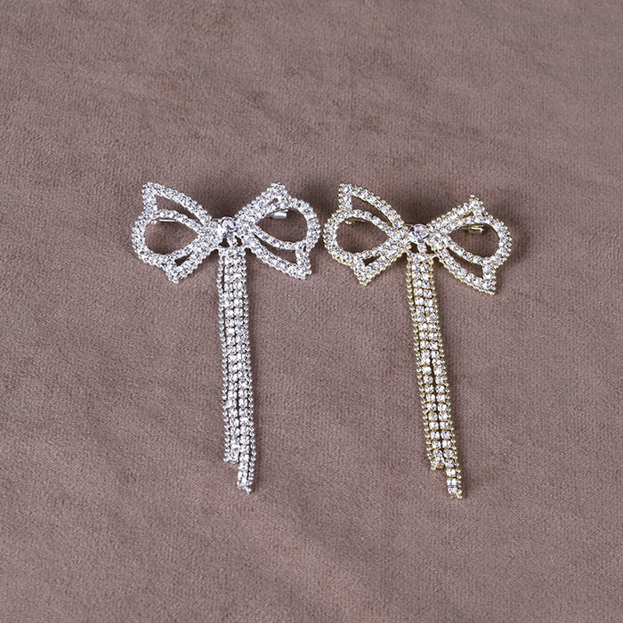 Crystal Bow Brooch With Two Long Chain Fringe Strands