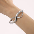 Figure Eight Curve Clasp Bangles Polished Gold and Steel Tone view 2