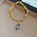 Nugget Bead Toggle Necklace And Bracelet With Pendant view 7
