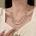 Pearl and Crystal Multistrand Necklace with Draped Gold Tone Chains view 1