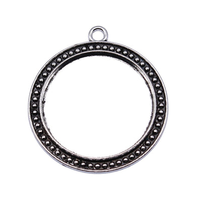 Beaded Round Open Pendant Frame displayed in a hand for shape and finish detail